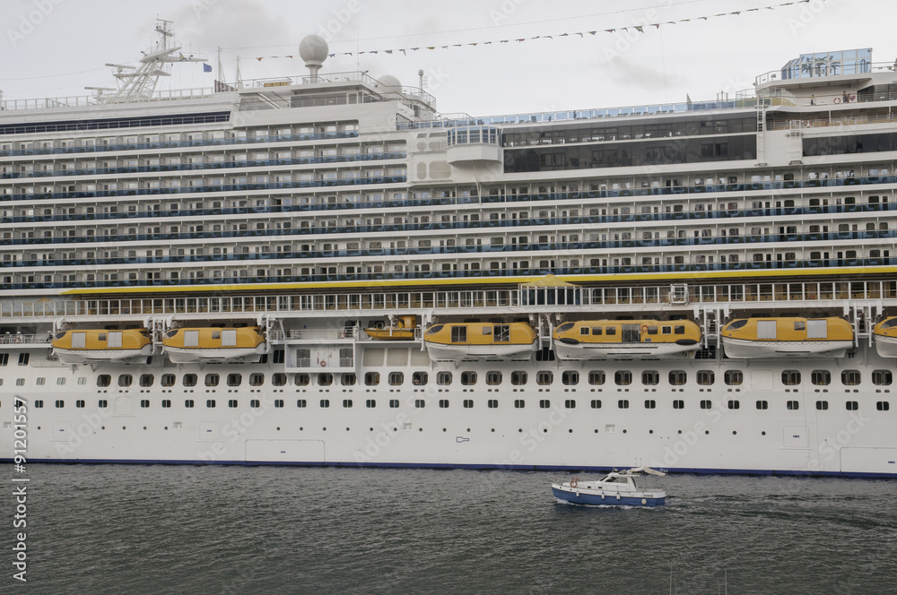 flank of ship from cruise with small boat flank of ship from cruise with small boat