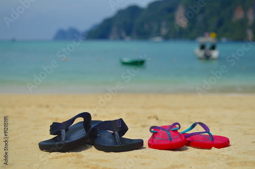 Flip flops parked on the beach