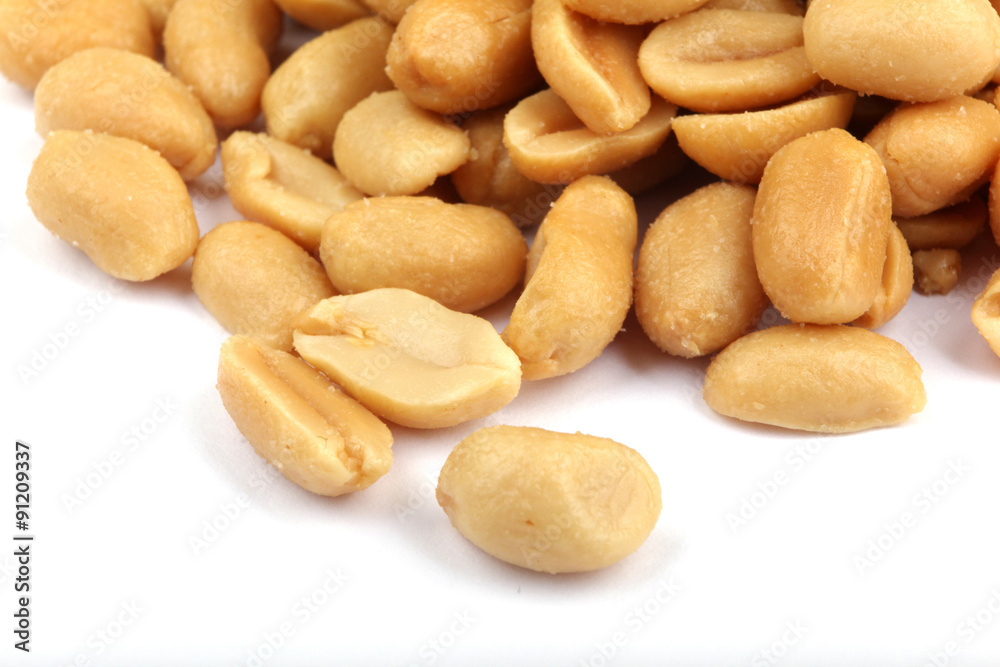 Close up of fried, peeled and salted peanuts. Close up of fried, peeled and salted peanuts.