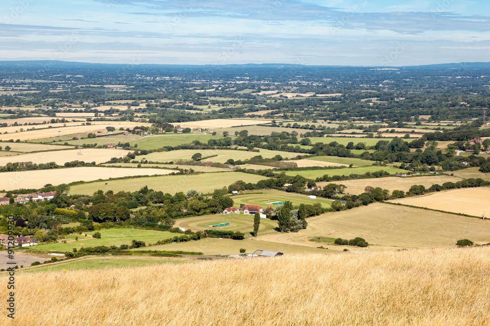 Fototapeta premium View of the South Downs: fields and the houses