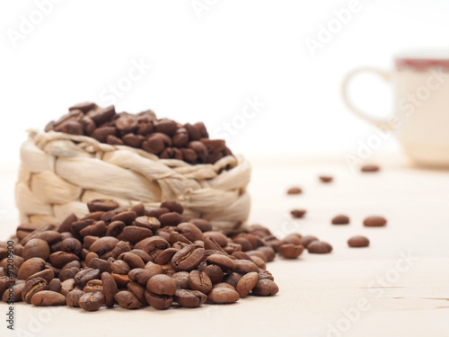 Fototapeta Naklejka Na Ścianę i Meble -  Fresh roasted coffee beans on a table 