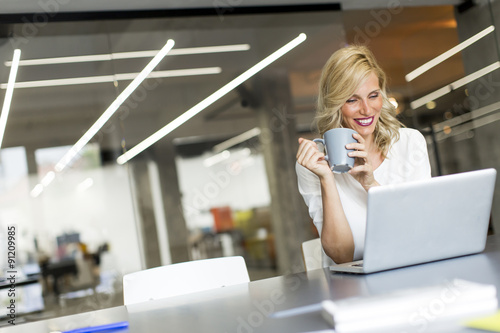 Young woman in the office
