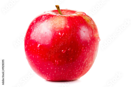 wet red delicious apple isolated on white