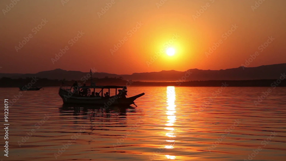 Boat with tourists on Irrawaddy river enjoying sunset, Bagan
Boat with tourists on Irrawaddy river enjoying sunset, Bagan