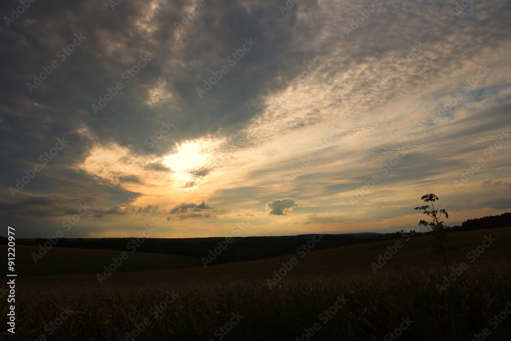 Sunset with bursting clouds