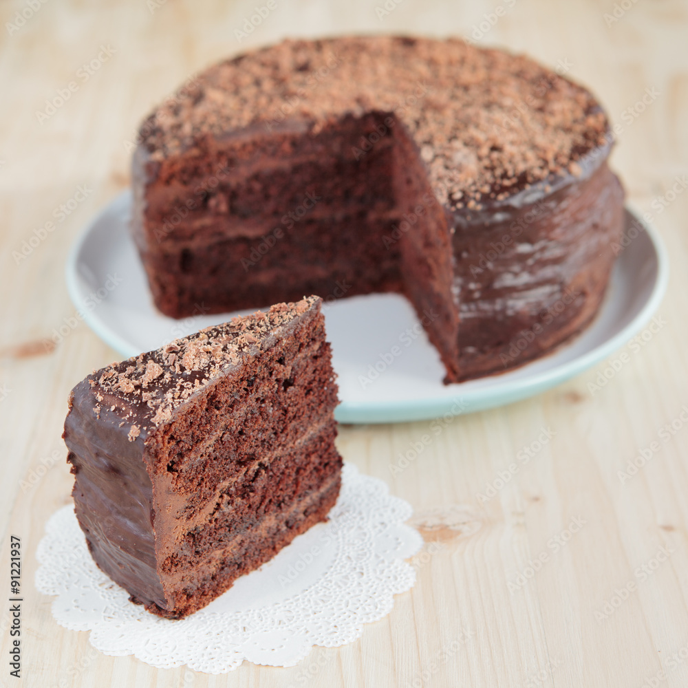Chocolate sponge cake with chocolate buttercream frosting and ganache Chocolate sponge cake with chocolate buttercream frosting and ganache