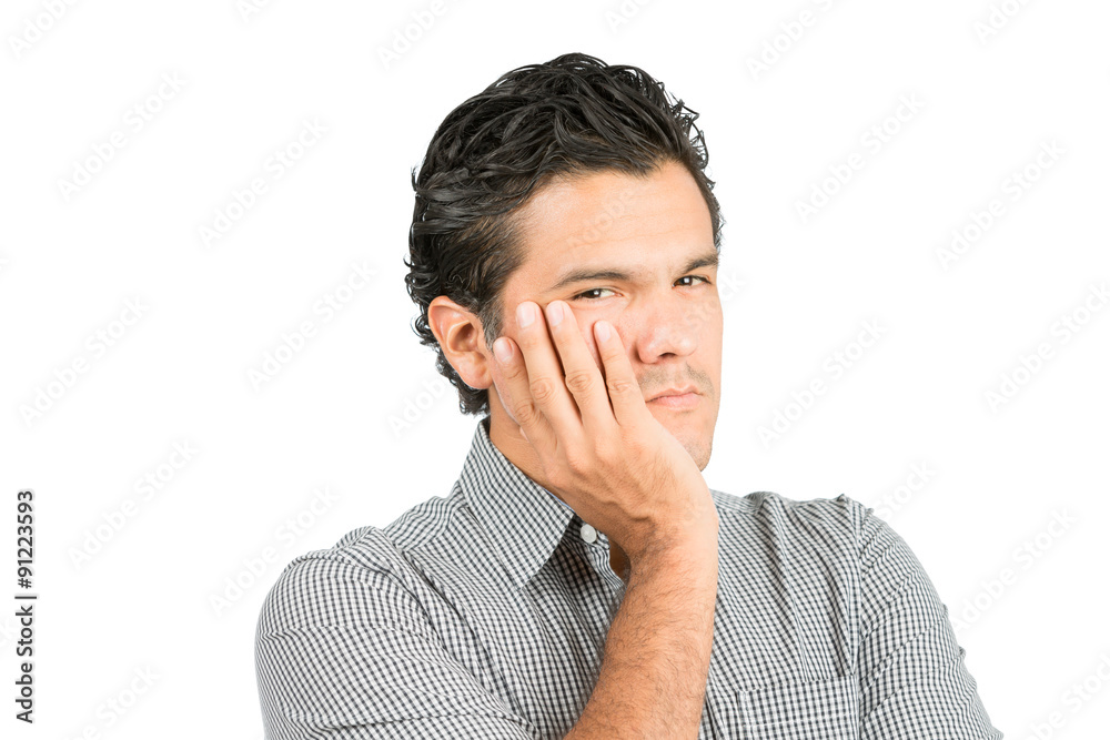 Concerned Hispanic Male Cupping Face Hand At Concerned Hispanic Male Cupping Face Hand At
