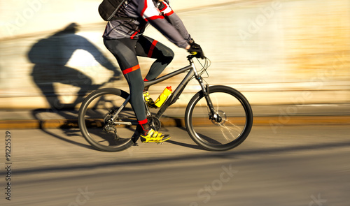 Cyclist in sunshine