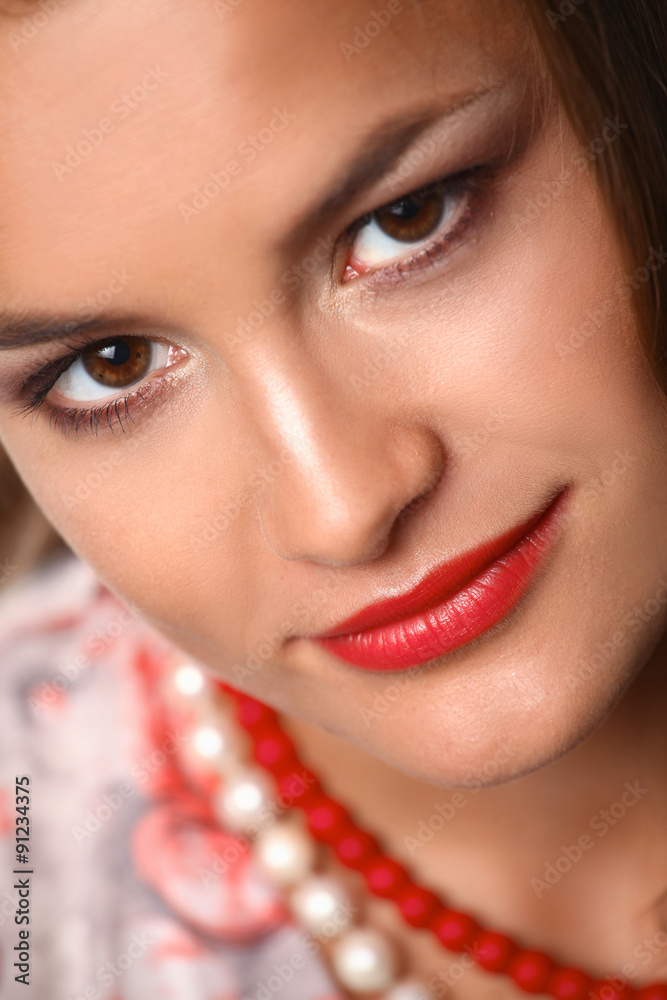Portrait of young beautiful brunette woman in beads Portrait of young beautiful brunette woman in beads