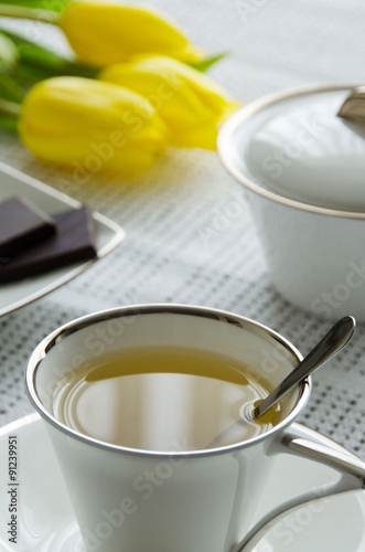 Cup of tea with chocolate