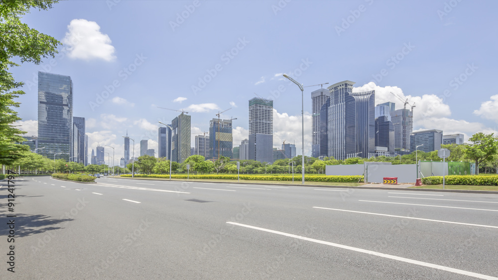 empty asphalt road and modern city shenzhen in china