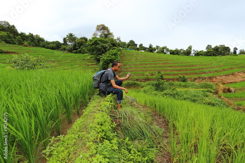 Man and Rice terraces in Mae Chaem at Thailand © pantkmutt
