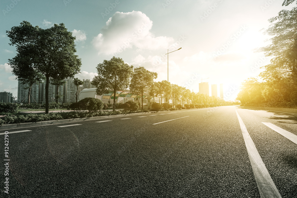 Fototapeta premium empty asphalt road under sunshine