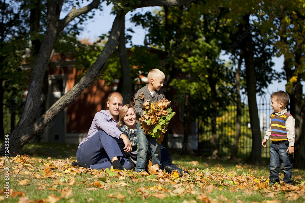Russian family, young parents and two sons Russian family, young parents and two sons