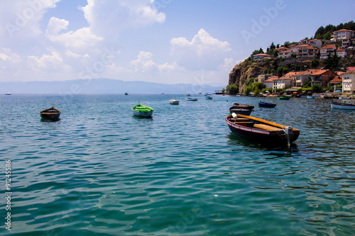 Obraz na płótnie Fishing boats with the view of the old town of Ohrid in the background. w salonie