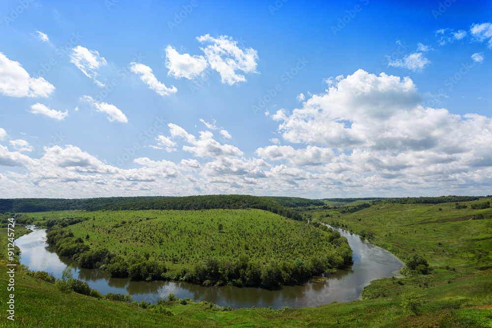 View of Krasivaya Mecha River from the high hill in the sunny summer day