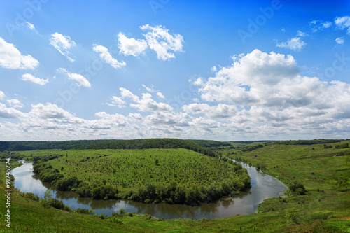 View of Krasivaya Mecha River from the high hill in the sunny summer day