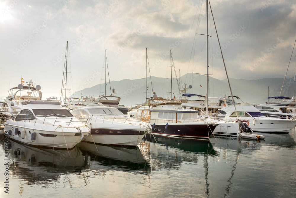 Beautiful white modern yachts at sea port in Montenegro
