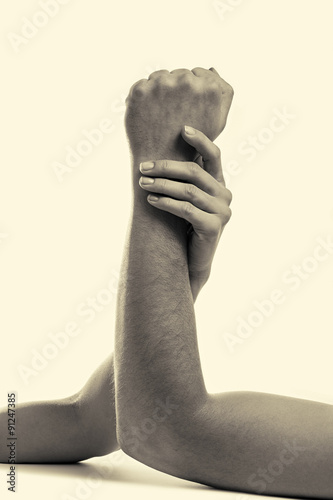  feminine and delicate interweaving of strong male hands