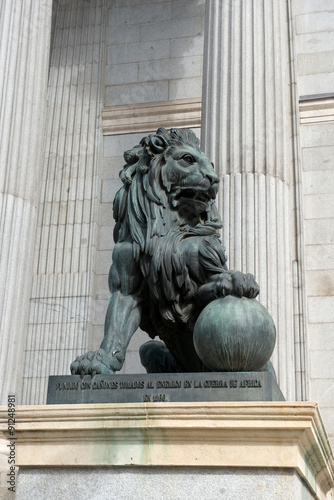 Lion`s statue at the front of Congress of Deputies of Spain, Madrid
