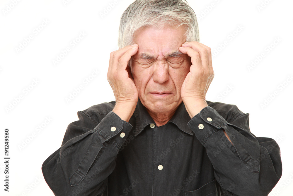 senior Japanese man suffers from headache senior Japanese man suffers from headache