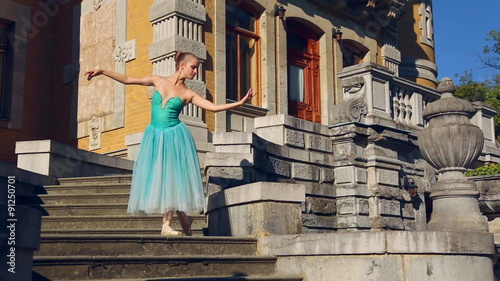 Ballerina in the old park of the palace  photo