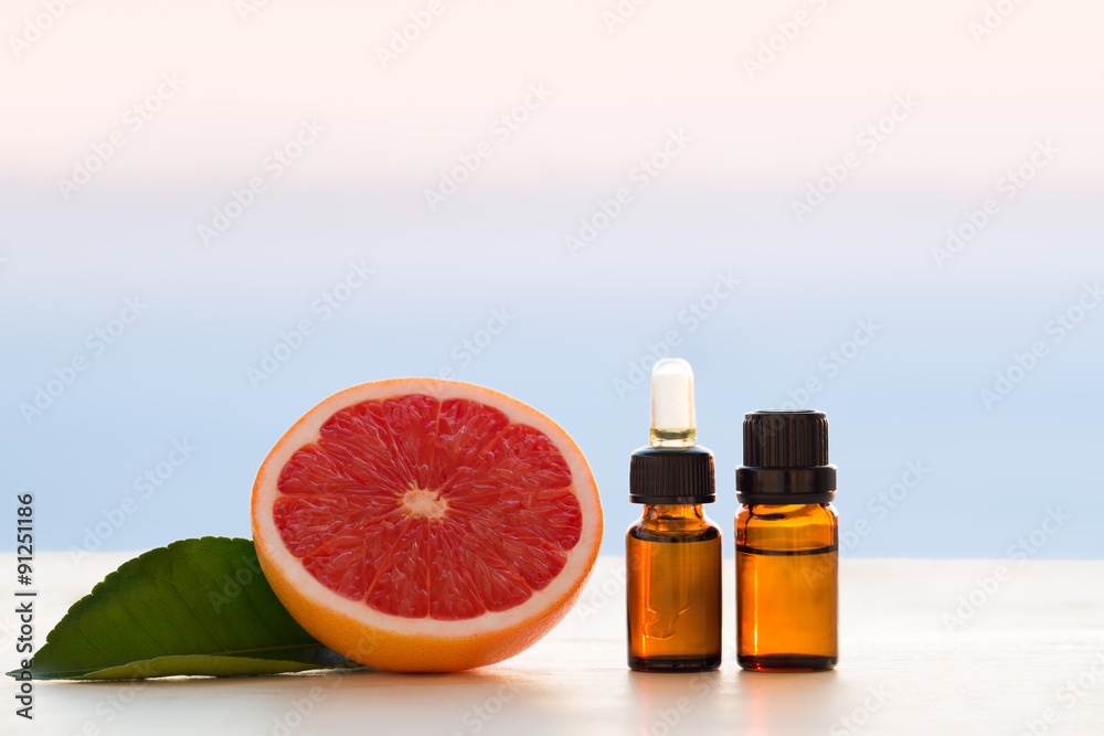 Grapefruit essential oils in bottles Grapefruit essential oils in bottles