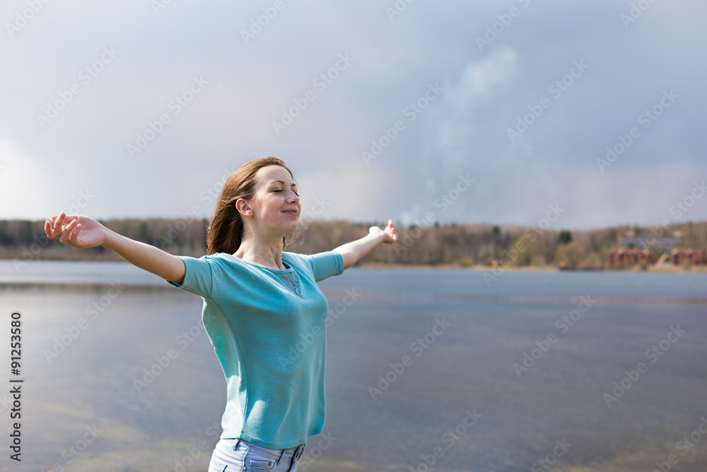 Freckled happy girl with closed eyes smiling to sun Freckled happy girl with closed eyes smiling to sun