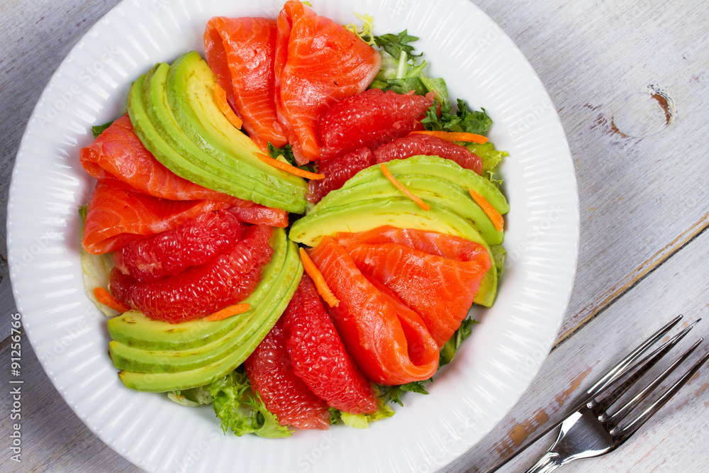 Smoked Salmon, Avocado and Grapefruit Salad. View from above, Studio Shot Smoked Salmon, Avocado and Grapefruit Salad. View from above, Studio Shot