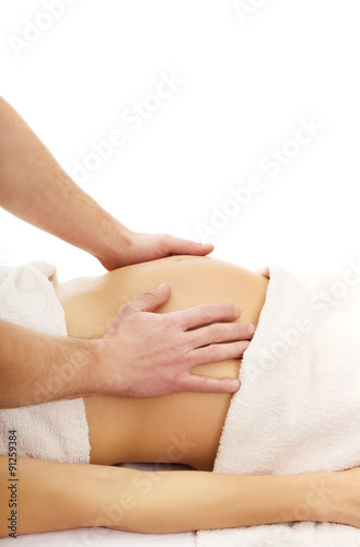 Pregnant woman having a relaxing massage
