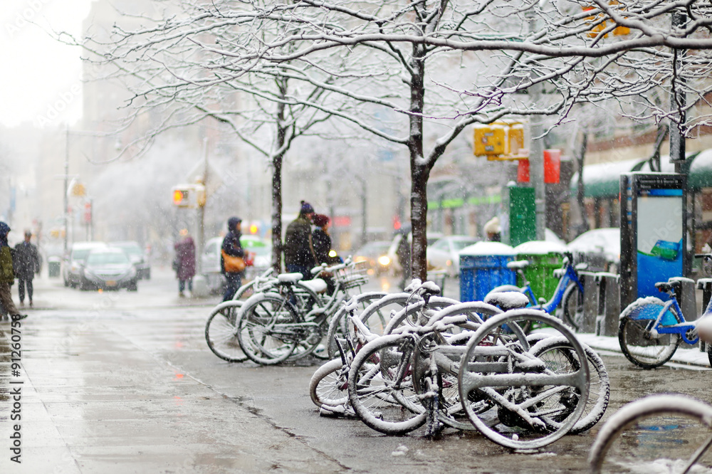 Snow covered bicycles in New York