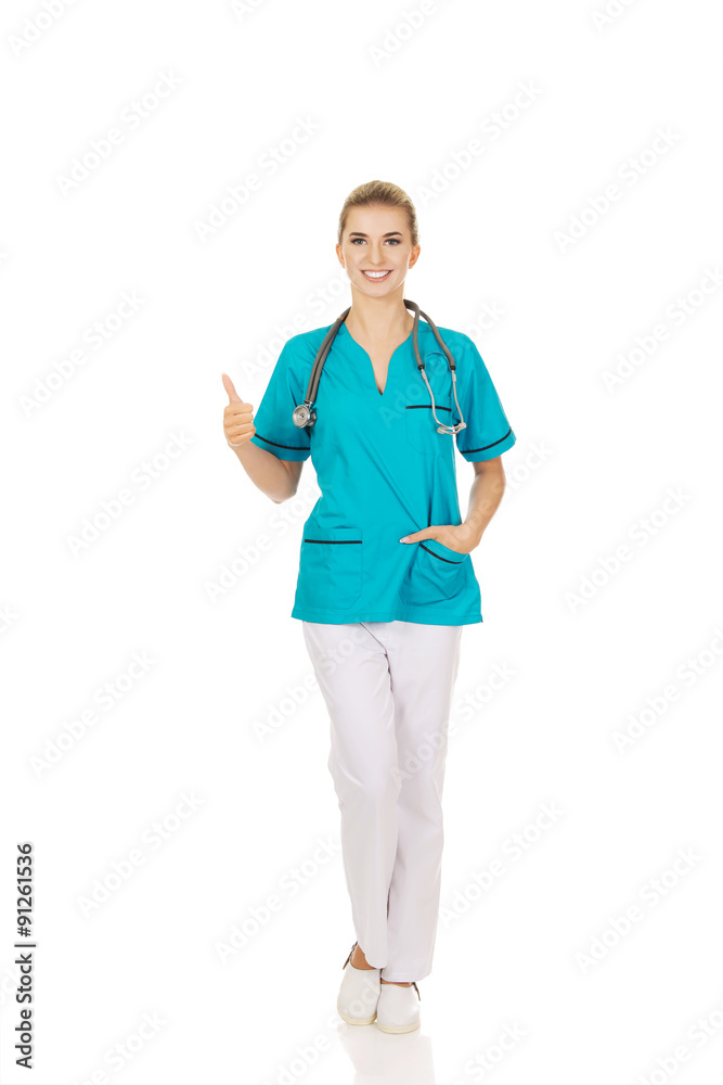 Happy female doctor or nurse with stethoscope Happy female doctor or nurse with stethoscope