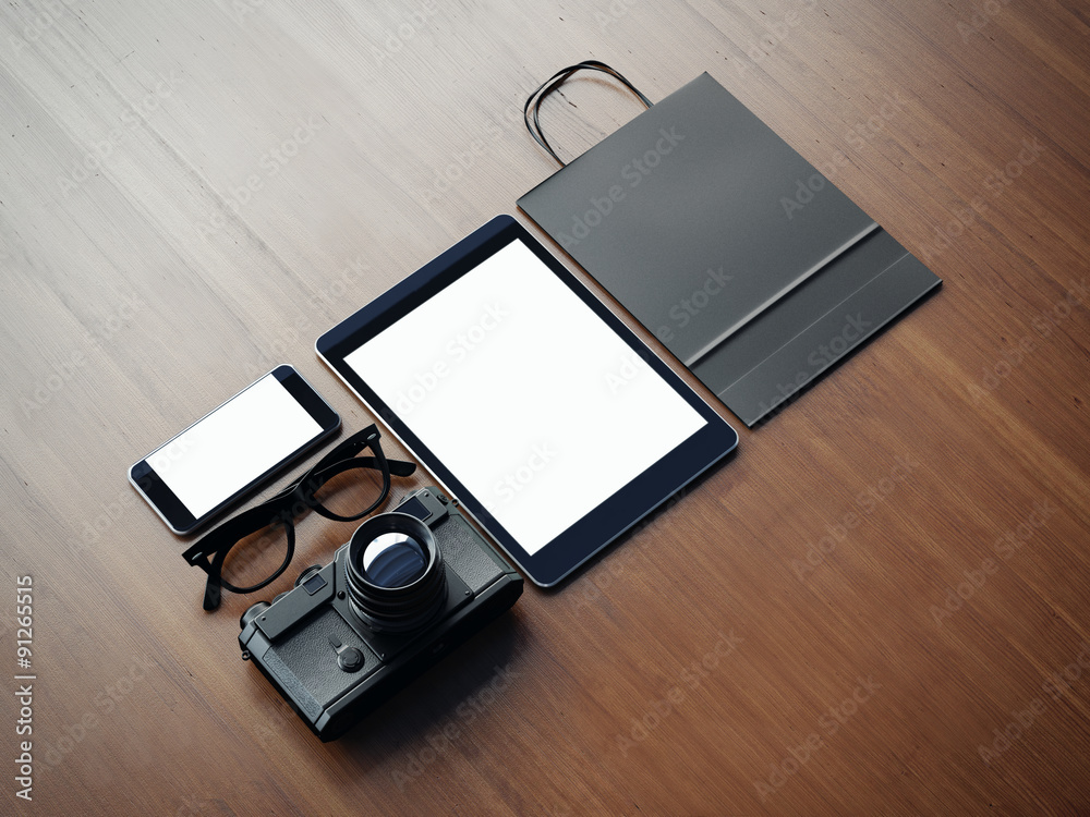 Mock up of classic workspace elements on the wooden background Mock up of classic workspace elements on the wooden background