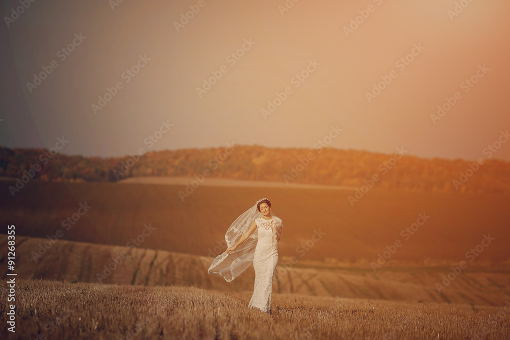 happy wedding couple in a field happy wedding couple in a field