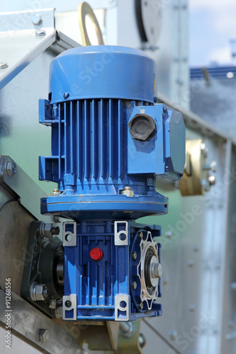 Blue powerful electric motors for modern industrial equipment