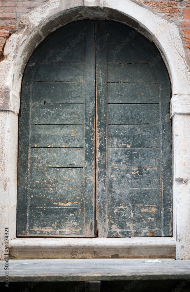 Wooden arched door in house