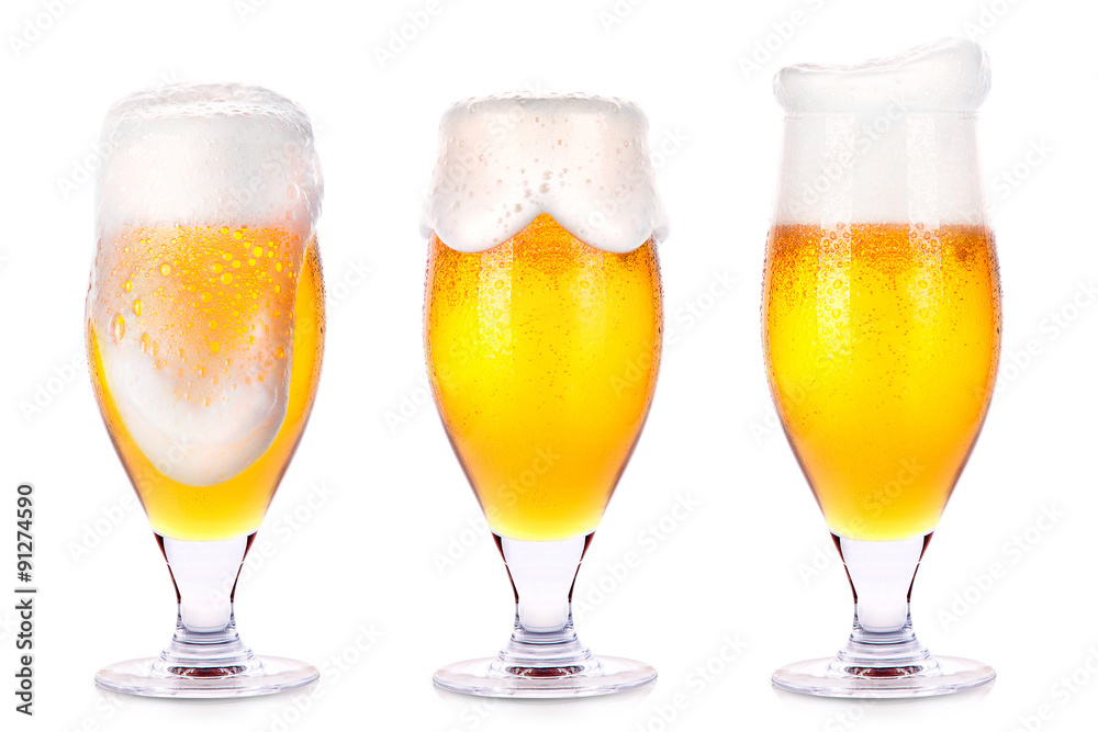 Frosty glasses of light beer isolated Frosty glasses of light beer isolated