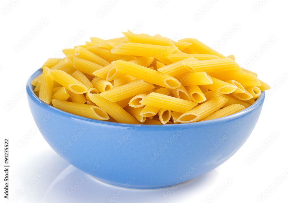 penne pasta in plate isolated on white
