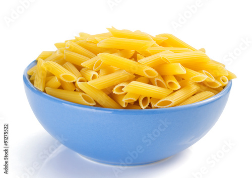 penne pasta in plate isolated on white