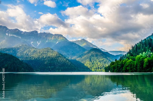 Fototapeta Naklejka Na Ścianę i Meble -  A view of the water and the mountains Lake Ritsa