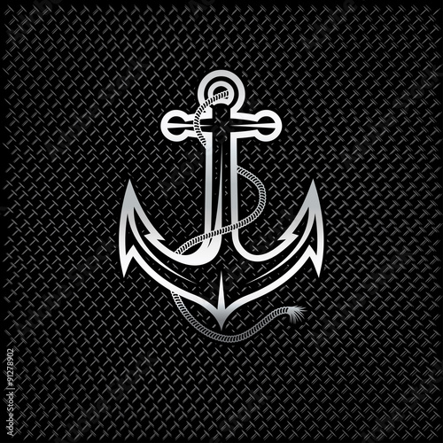 silver anchor with rope on metal background