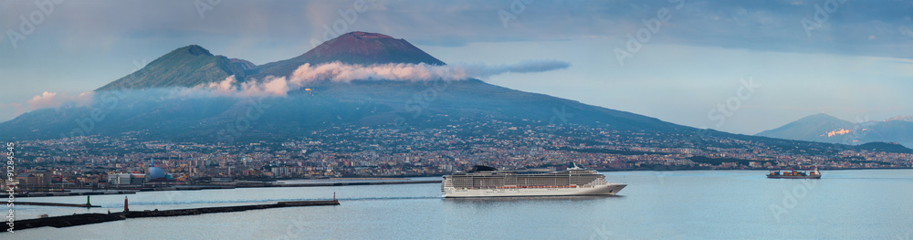 Evening panorama of Naples, view of the port in the Gulf of Naples and Mount Vesuvius. The province of Campania. Italy.