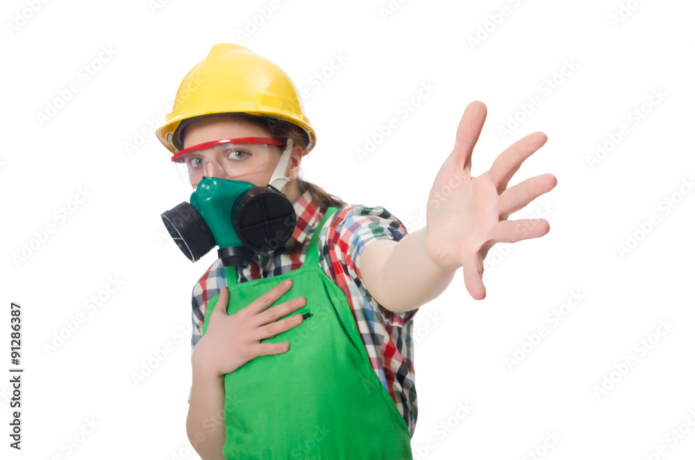 Female worker wearing coverall and gas mask isolated on white