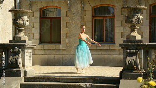 Ballerina in the old park of the palace  photo