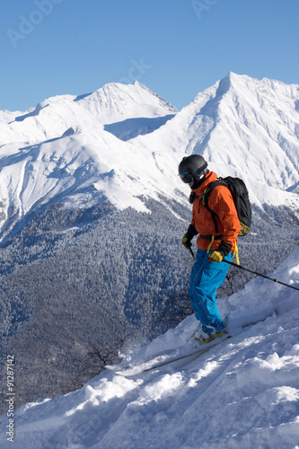 Skier in deep powder, extreme freeride