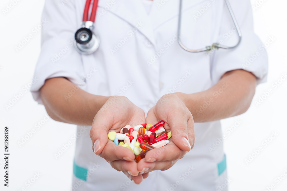 Skilled female general practitioner is treating her patient Skilled female general practitioner is treating her patient