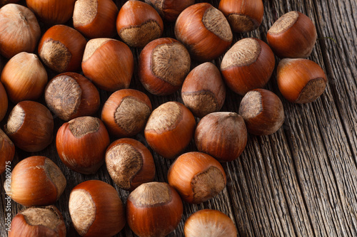 Hazelnuts on rustic wooden table