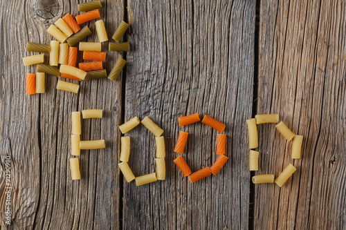 Word laid out from pasta on a rustic boards