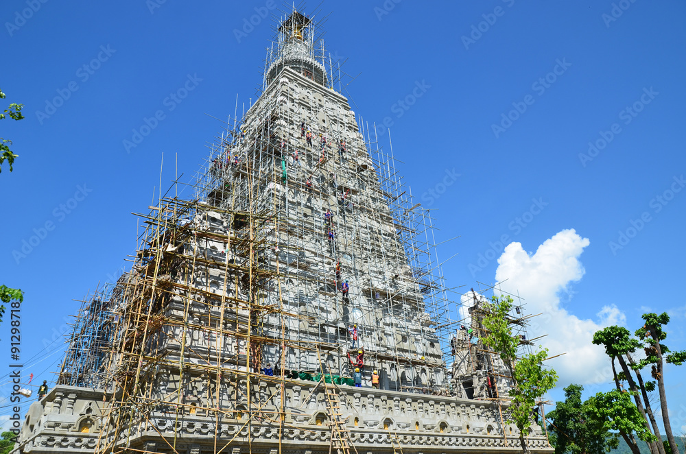 People building at the Wat joung kum temple in Lampang Thailand