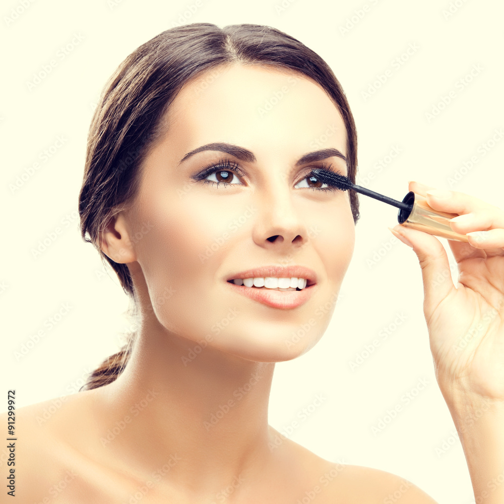 woman with cosmetics brush